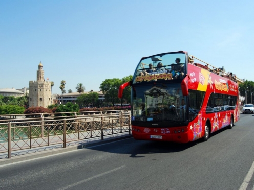 Hop on Hop off city sightseeing bus in Seville with complementary 4 walking tours.