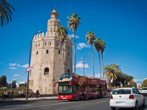 Hop on Hop off city sightseeing bus Seville with complementary 4 walking tours.