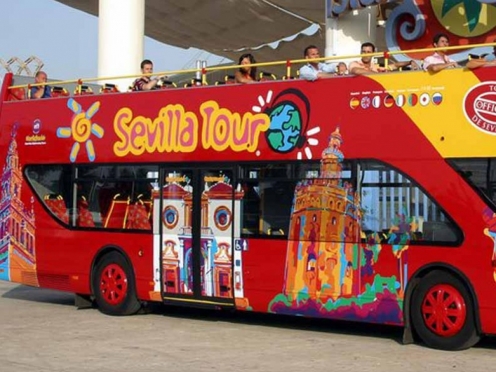 Hop on Hop off city sightseeing bus in Seville with complementary 4 walking tours.